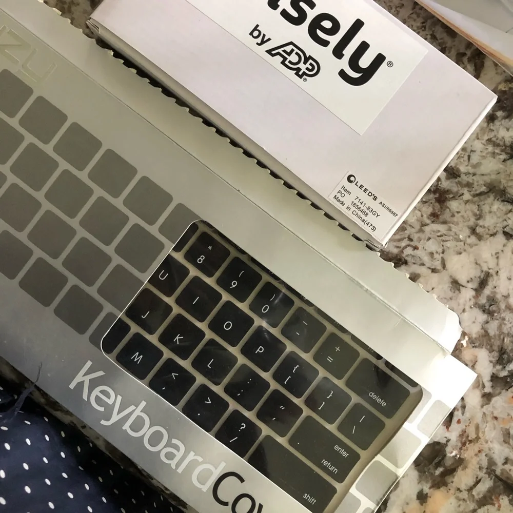 Keyboard cover and ultra thin phone charging pad bundle